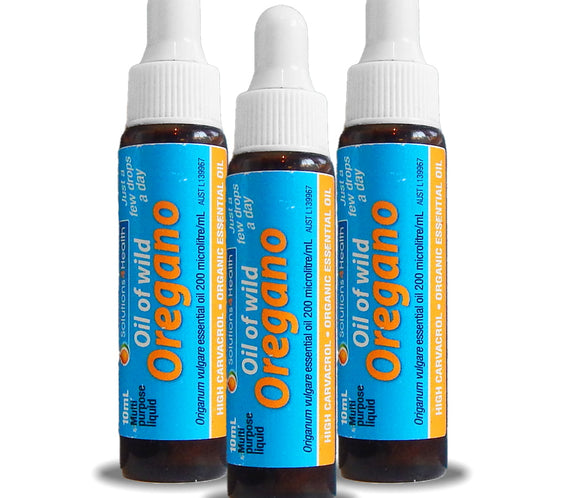 Three bottles of Oil of Wild Oregano on a white background