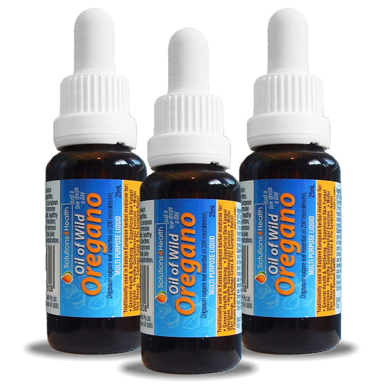 Three bottles of Oil of Wild Oregano on a white background