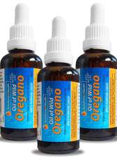 Three bottles of Oil of Wild Oregano on a white background
