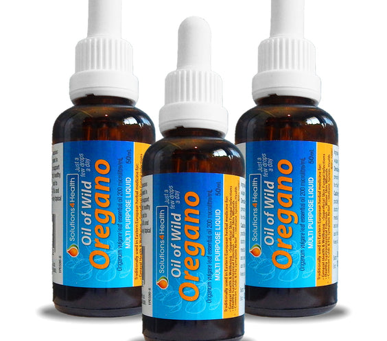 Three bottles of Oil of Wild Oregano on a white background