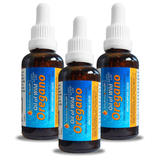 Three bottles of Oil of Wild Oregano on a white background