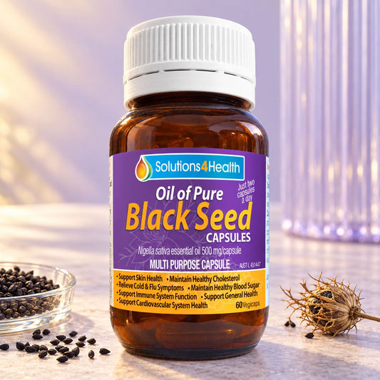 Solutions4Health Oil of Pure Black Seed 60 Capsules bottle with black seeds against a soft lilac background.