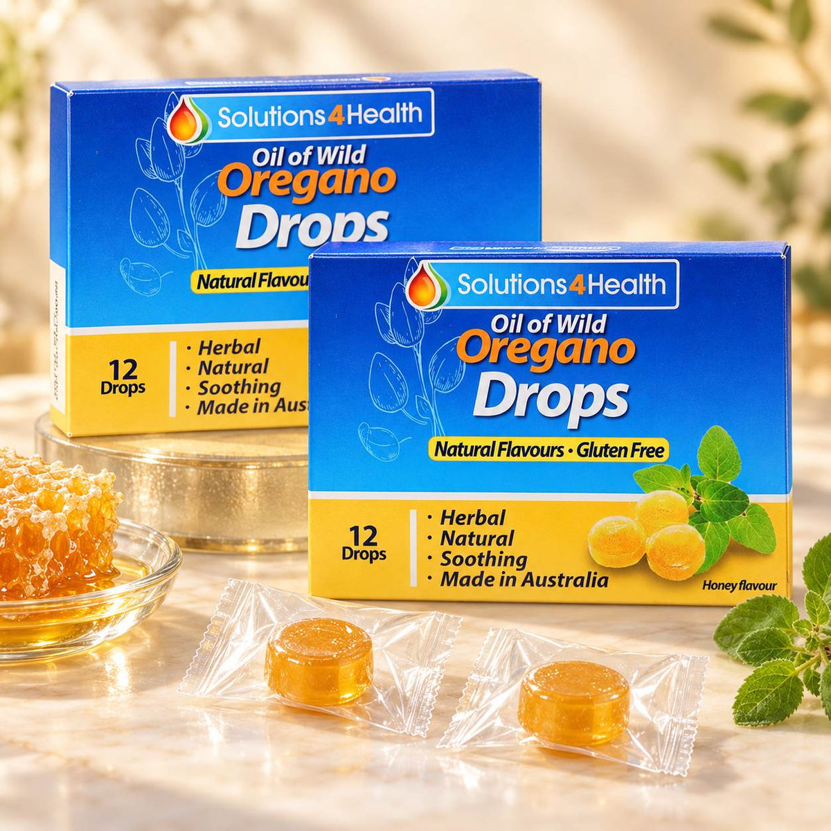Solutions4Health Oil of Wild Oregano 12 Drops twin pack with individually wrapped lozenges, honeycomb and fresh oregano.