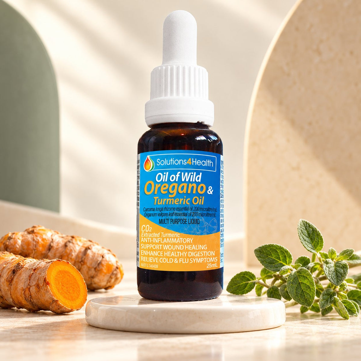 Solutions4Health Oil of Wild Oregano & Turmeric 25 ml dropper bottle with turmeric root and oregano sprigs.